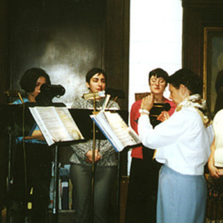 Choir director Natasha Lutov and the choir