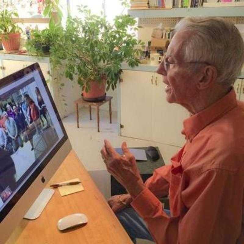 Mr. Davis speaks to a group in Germany via Skype