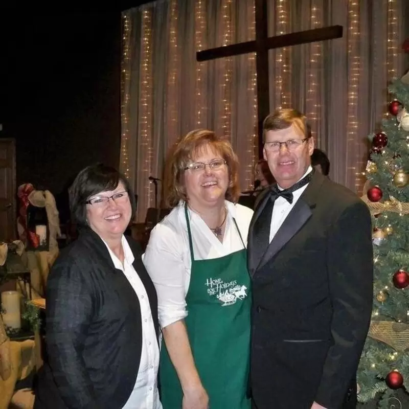 Kelly Valentine (left), MaryAnn Cook, and Pastor Steve Cook at a Christmas event at the church - photo courtesy of Morris Herald-News