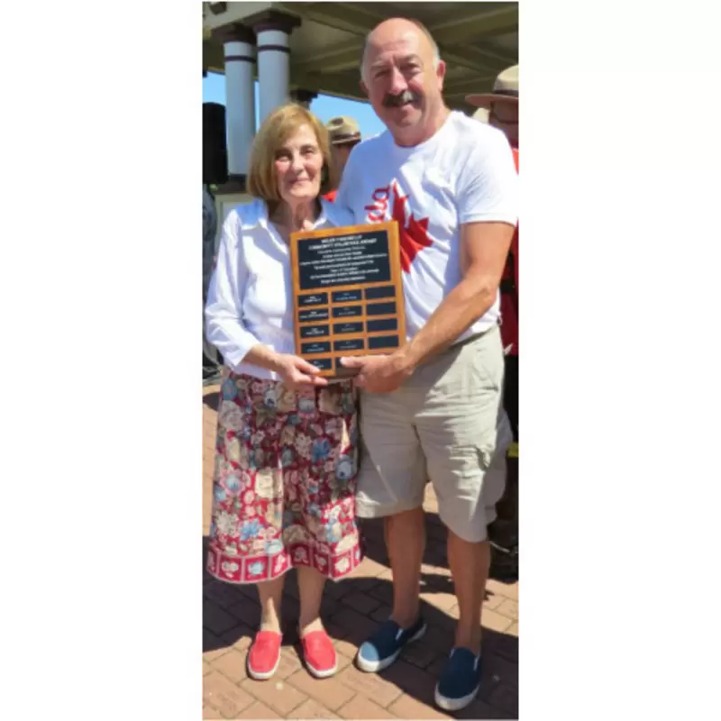 Louise McKee receiving the “Volunteer of the Year” award from the Town of Hampton