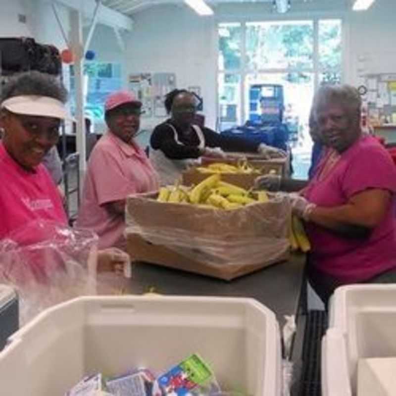 Antioch Baptist Church members helping pack meals for Meals on Wheels Durham