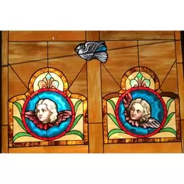 Memorial Stained Glass Window dedicated to a parishioner's two daughters who died at a young age