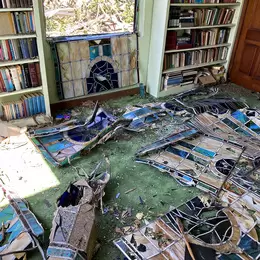 Shattered panels of stained glass on the floor in Chapel of the Cross Episcopal Church - photo courtesy of Maya Miller, Gulf States Newsroom