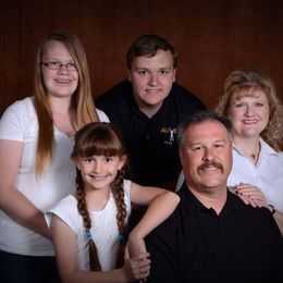 Pastor Greg, wife Kim, and family