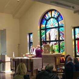 Fr. Charles Zichella, OFM Cap., Chapel Director at Holy Cross Catholic Funeral Home, celebrating Mass in the Chapel of St. Joseph.