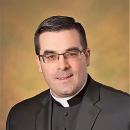 Rev. Michael L. Sartori